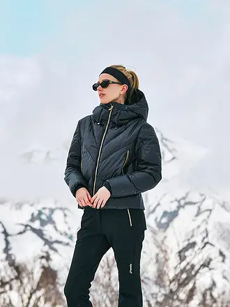 PHENIX | Pantaloni da sci da donna con taglio irregolare e imbottitura in piuma |